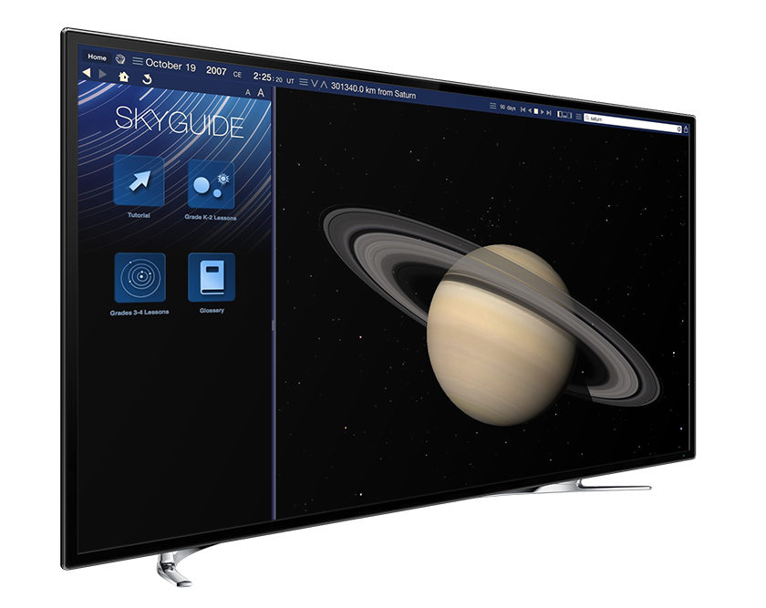 Apple iMac running Starry Night Elementary School software showing a planet Saturn simulation