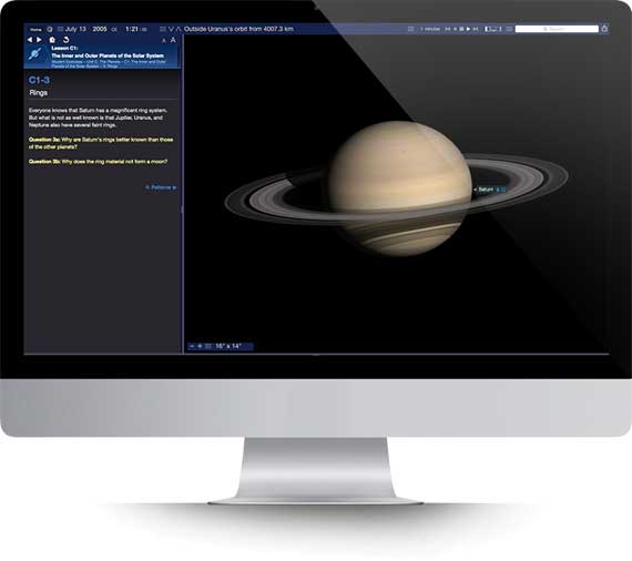 Apple iMac running Starry Night Middle School software showing a planet Saturn simulation